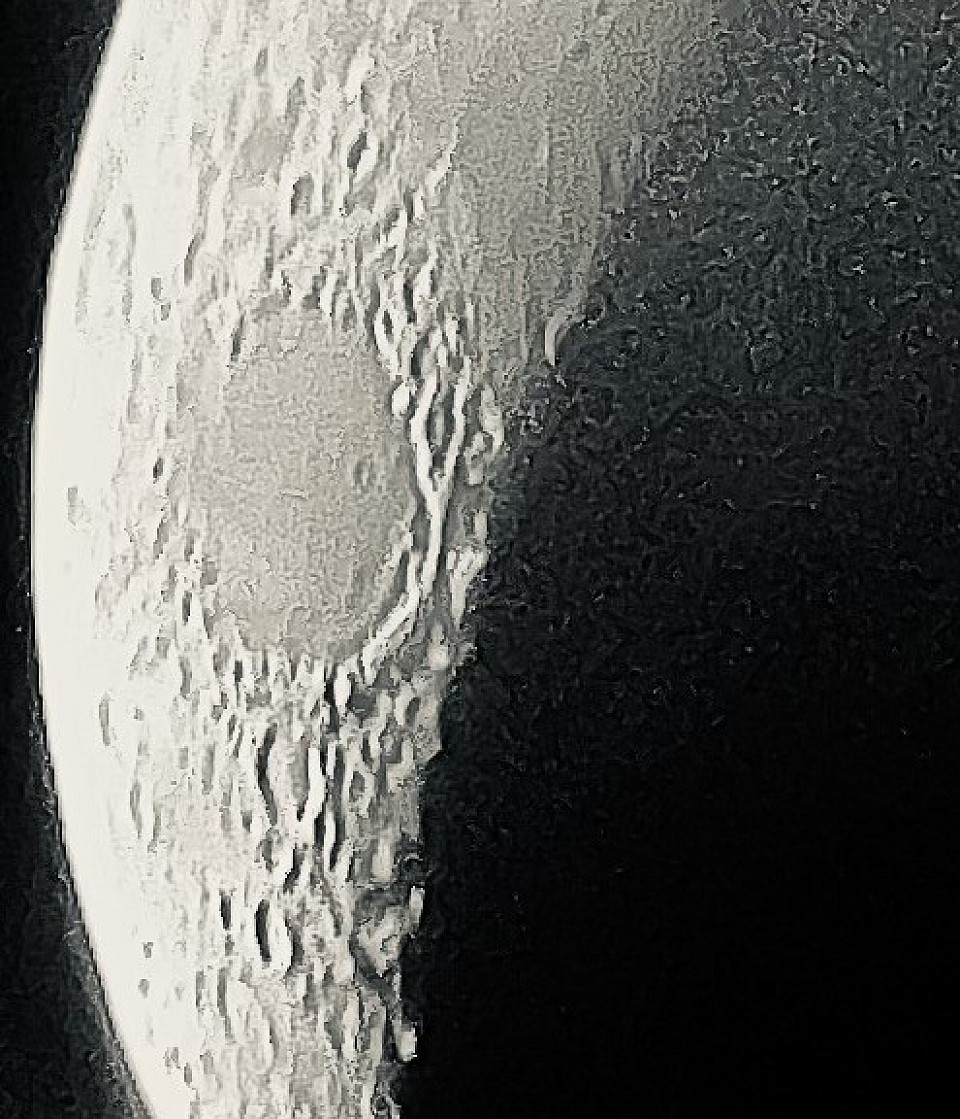 Image of the moon has taken through the eyepiece of my sky watcher 114P on my iPhone
